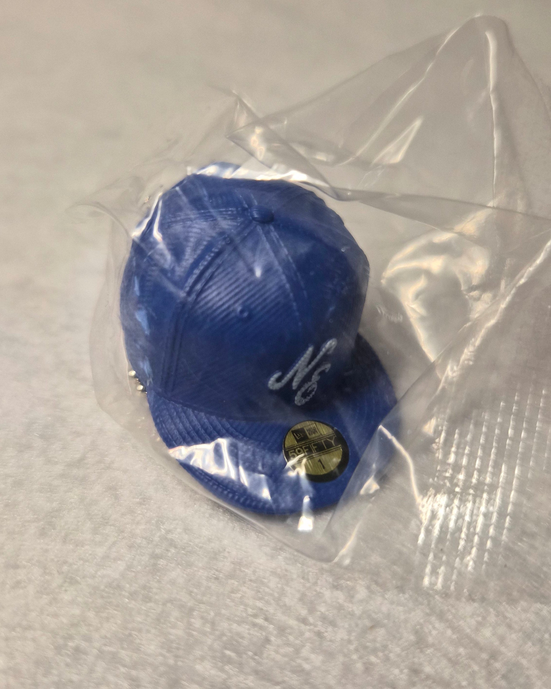 🧢 Colección Miniaturas Gorra New Era - Colgante