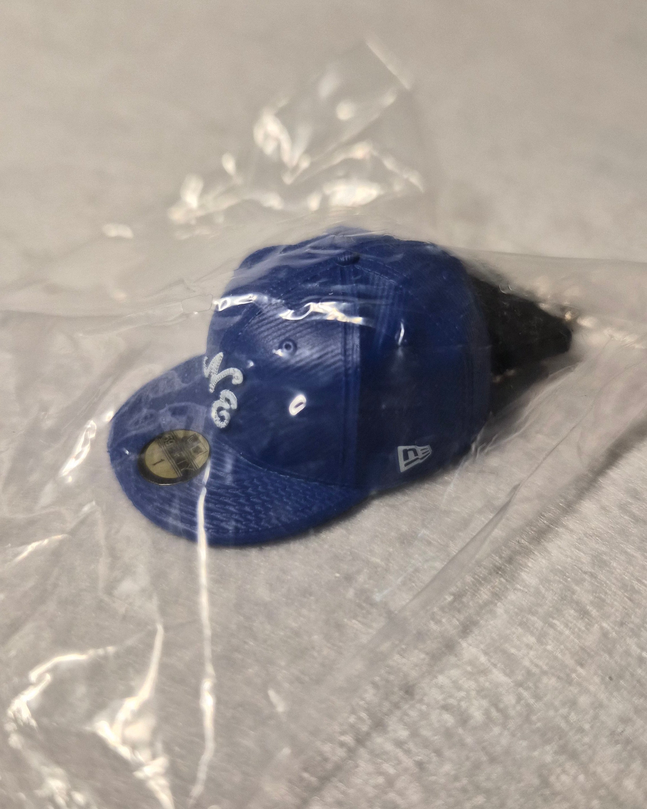 🧢 Colección Miniaturas Gorra New Era - Colgante