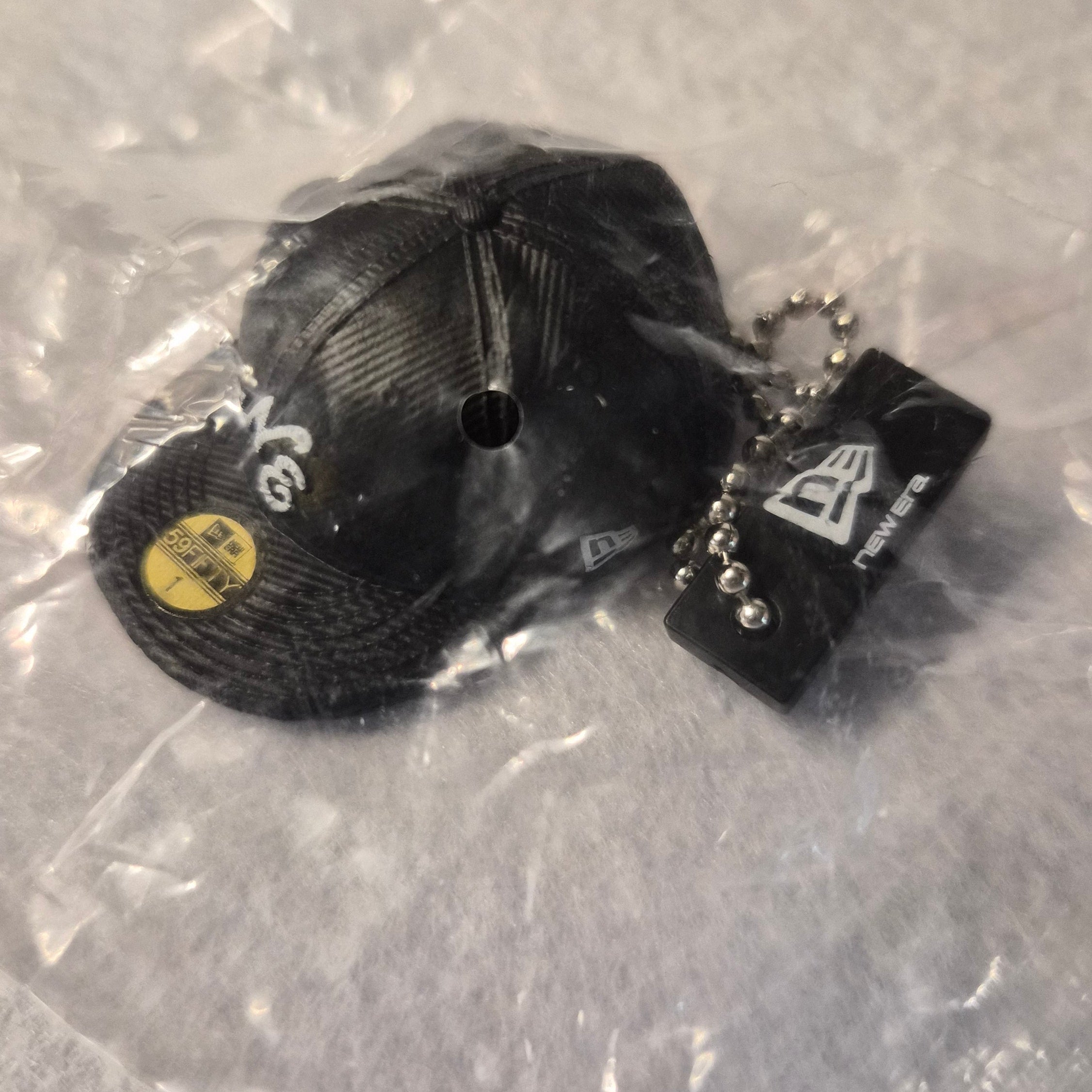 🧢 Colección Miniaturas Gorra New Era - Colgante