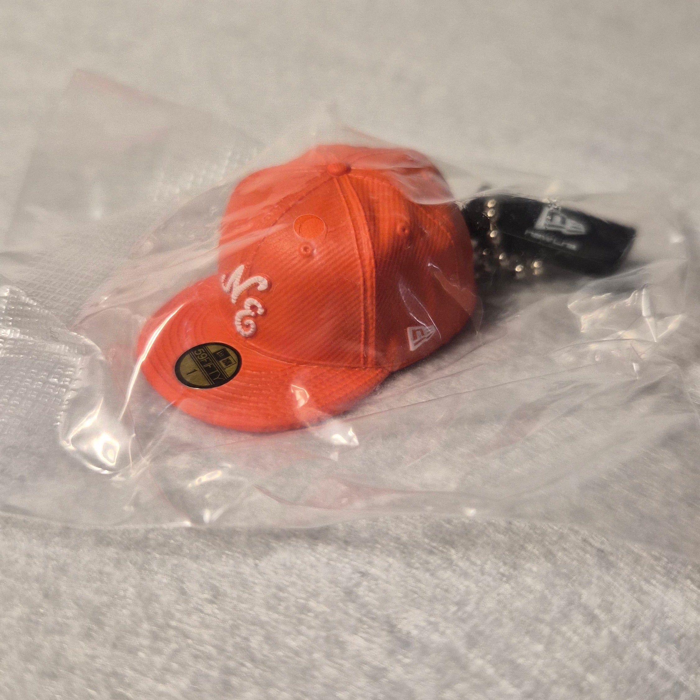 🧢 Colección Miniaturas Gorra New Era - Colgante